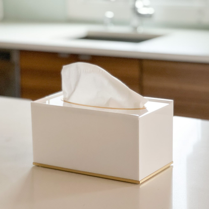 white lucite tissue box with gold rim